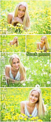        / Girl in a field with flowers and  ...